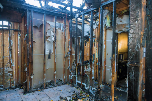 Professional Fire Damage Restoration technician working in Bayside, WI